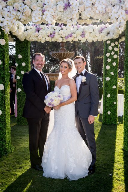 Leslie with couple after ceremony