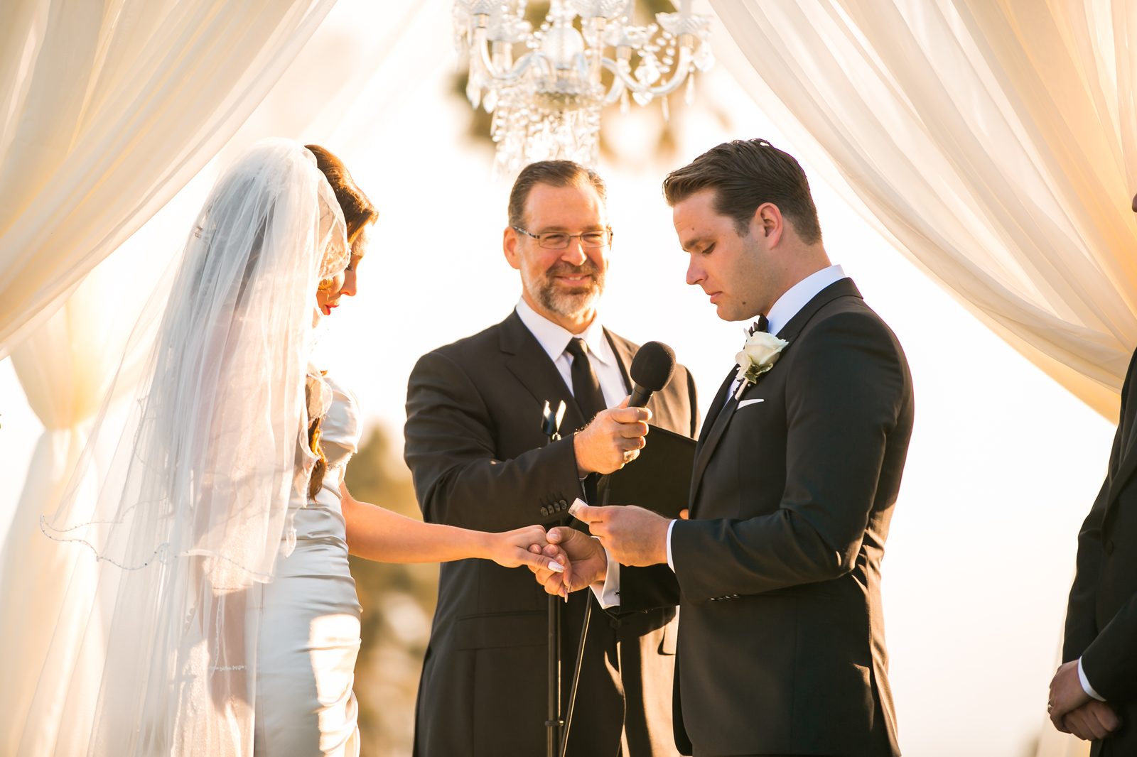 Ring exchange at golden hour ceremony